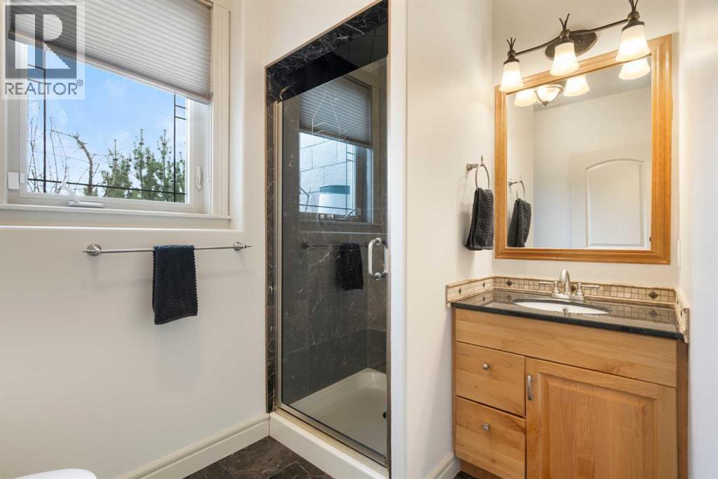 104 Grizzly Rise, Rural Rocky View County, Alberta  T4C 0B5 - Photo 30 - A2254075