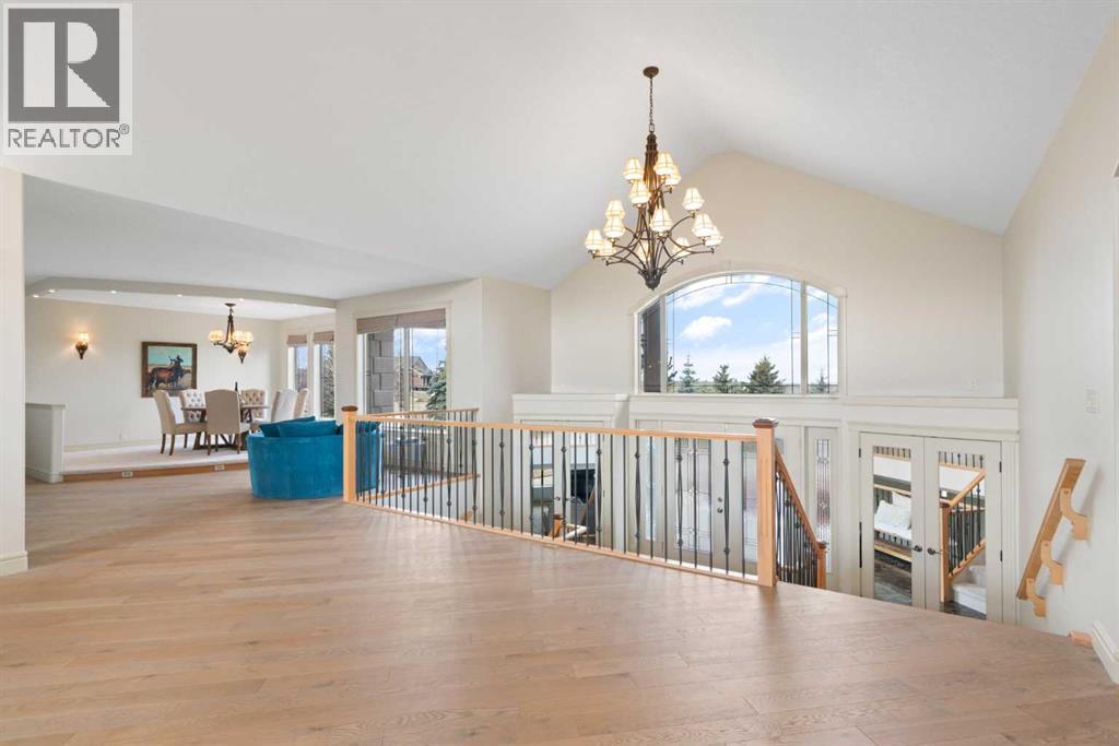 104 Grizzly Rise, Rural Rocky View County, Alberta  T4C 0B5 - Photo 4 - A2254075