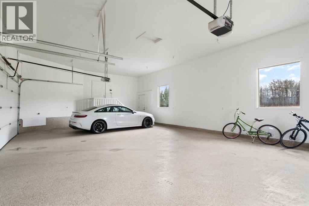 104 Grizzly Rise, Rural Rocky View County, Alberta  T4C 0B5 - Photo 41 - A2254075