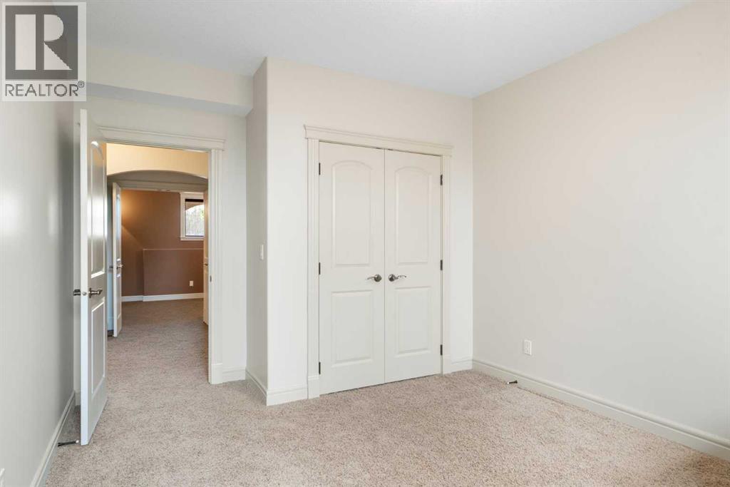 104 Grizzly Rise, Rural Rocky View County, Alberta  T4C 0B5 - Photo 36 - A2254075