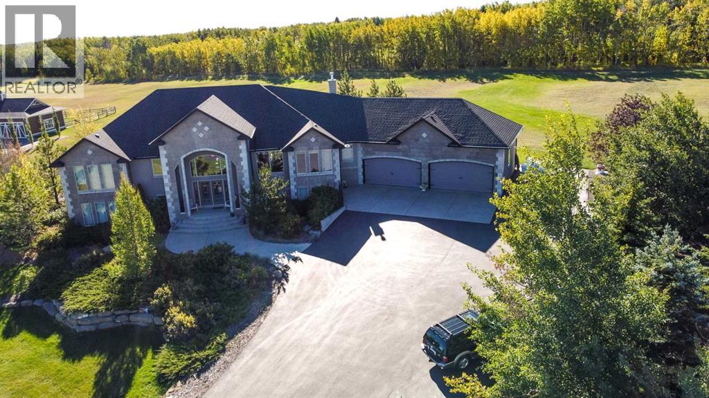 104 Grizzly Rise, Rural Rocky View County, Alberta  T4C 0B5 - Photo 47 - A2254075