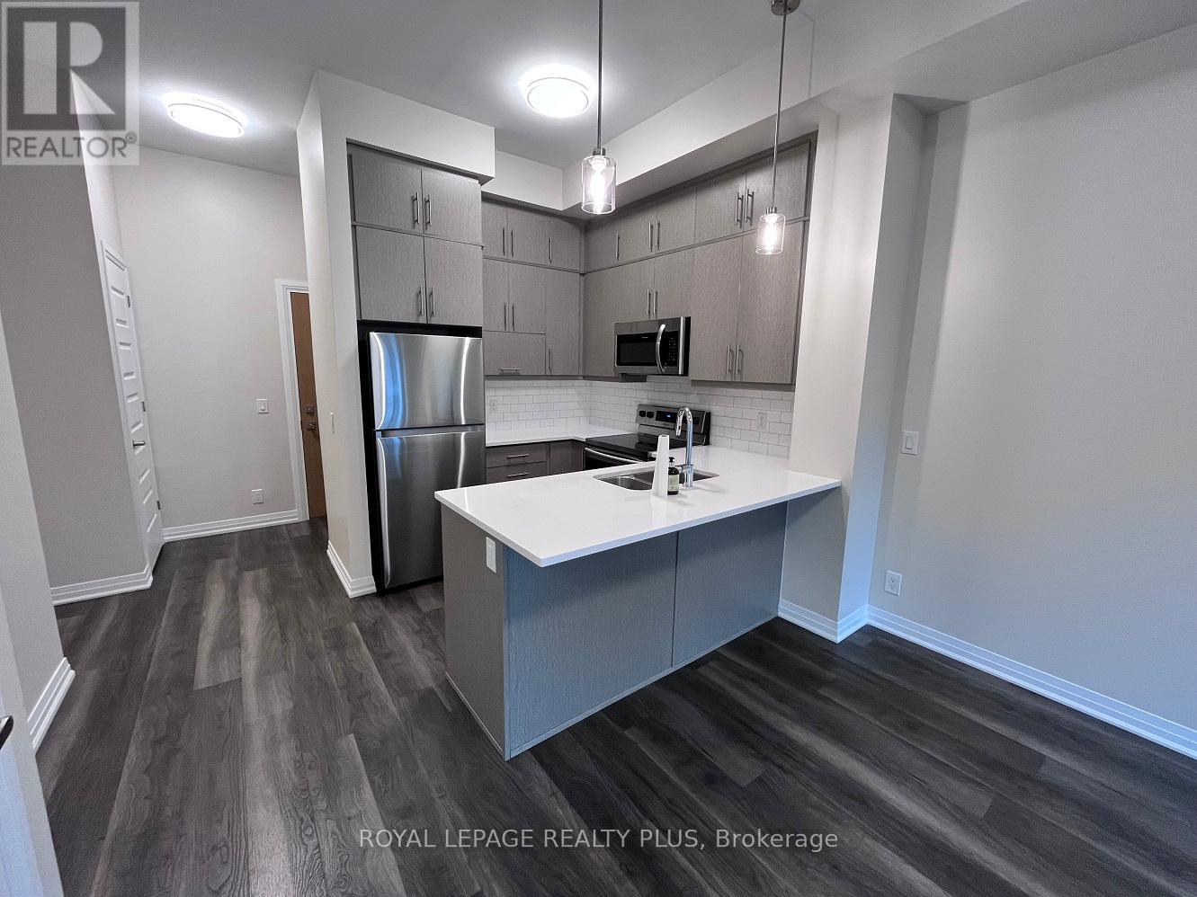 625 - 128 Grovewood Common, Oakville, Ontario  L6H 0X3 - Photo 6 - W12525952