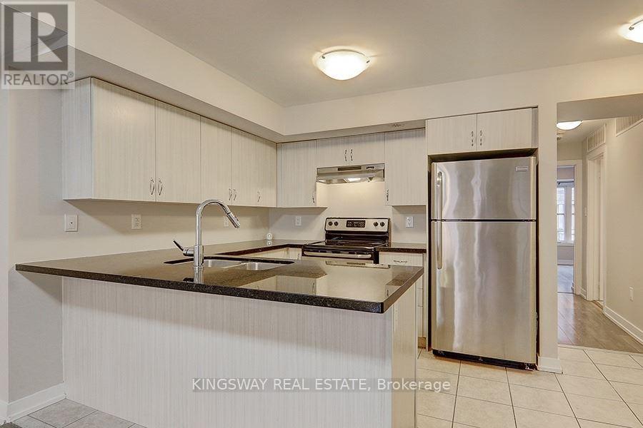 92 - 100 Parrotta Drive, Toronto, Ontario  M9M 0G1 - Photo 6 - W12526020