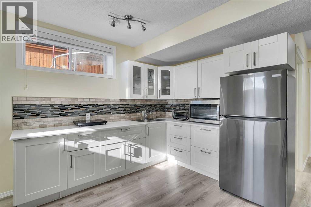 1535 Ravensmoor Way Se, Airdrie, Alberta  T4A 0V9 - Photo 28 - A2267306