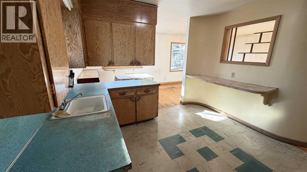 8 Carnarvon Way Nw, Calgary, Alberta  T2K 1W4 - Photo 9 - A2267074