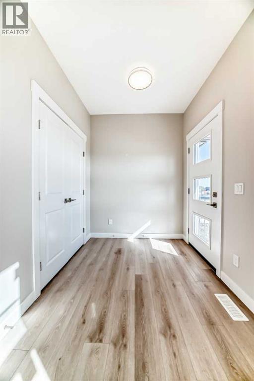 156 Belvedere Park Se, Calgary, Alberta  T2A 8A1 - Photo 3 - A2268376