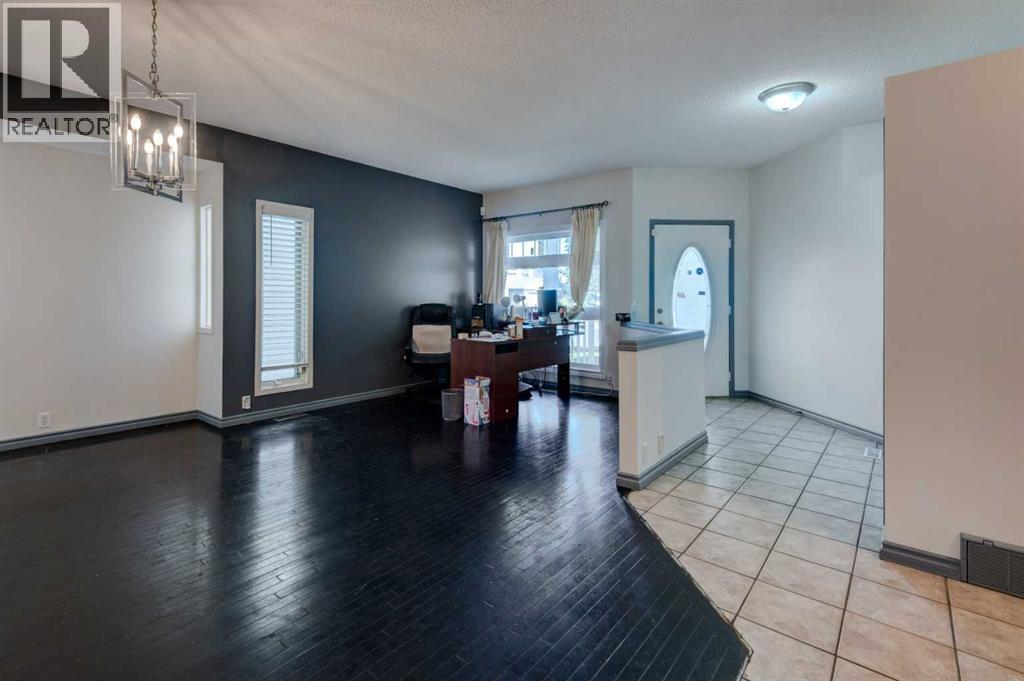 414 Mt Cornwall Circle Se, Calgary, Alberta  T2Z 2J6 - Photo 2 - A2269545