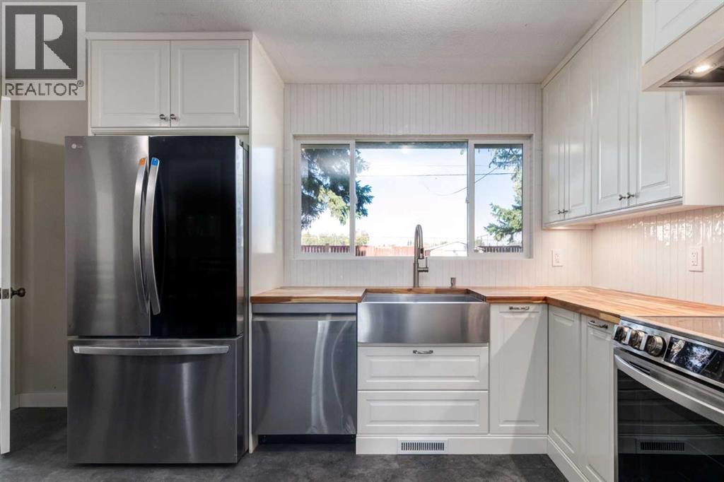 840 Raynard Crescent Se, Calgary, Alberta  T2A 1X7 - Photo 5 - A2258978