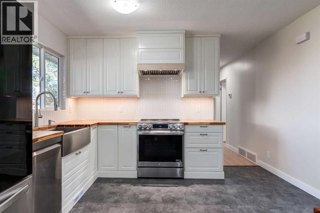 840 Raynard Crescent Se, Calgary, Alberta  T2A 1X7 - Photo 6 - A2258978