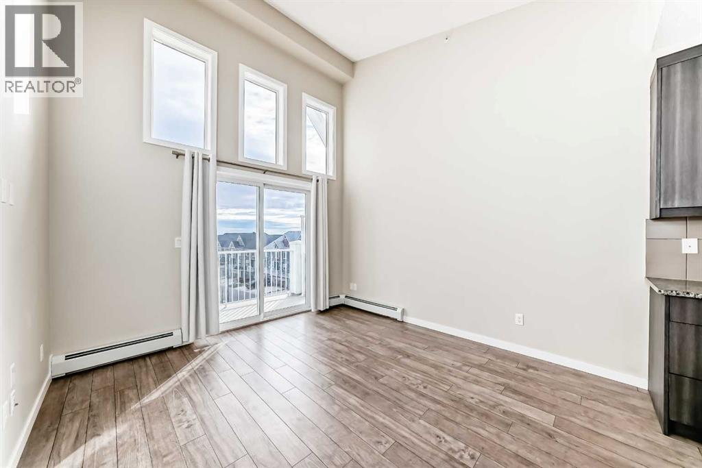 415, 402 Marquis Lane Se, Calgary, Alberta  T3M 2G7 - Photo 3 - A2268077