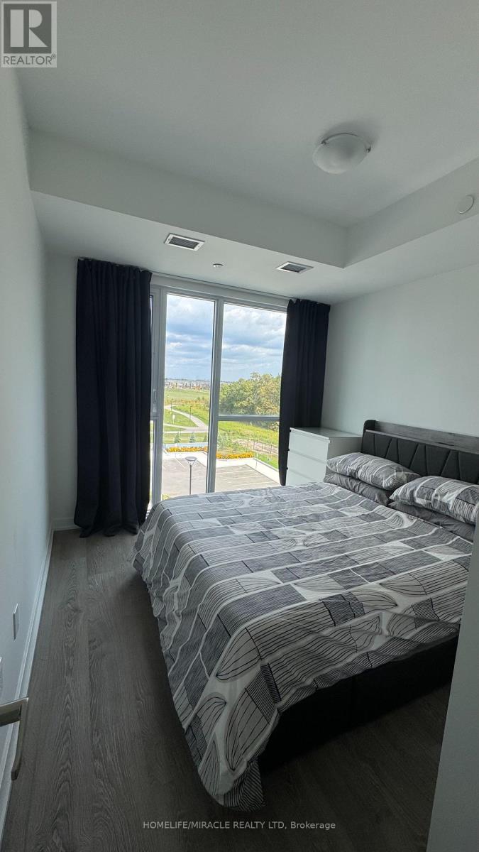 409 - 760 Whitlock Avenue, Milton, Ontario  L9E 1S2 - Photo 15 - W12481738