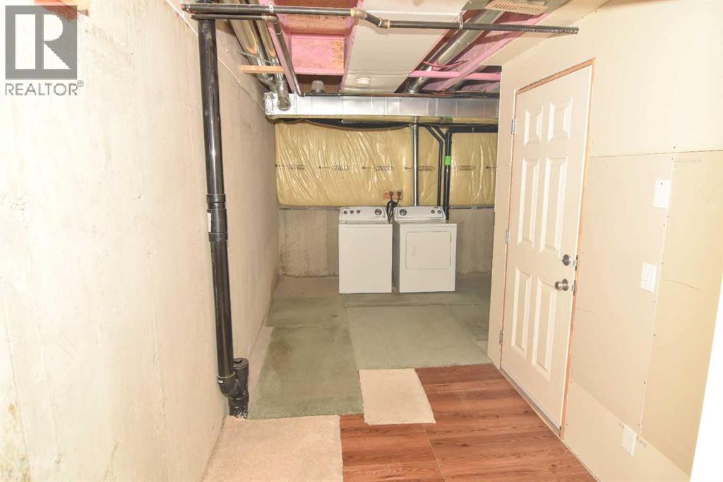 156 Pantego Lane Nw, Calgary, Alberta  T3K 0T1 - Photo 20 - A2260230