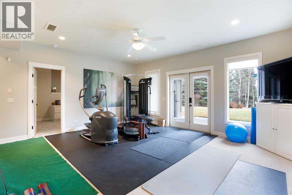 311 Rodeo Ridge, Rural Rocky View County, Alberta  T2Z 3G2 - Photo 35 - A2268978