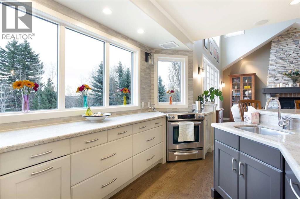 311 Rodeo Ridge, Rural Rocky View County, Alberta  T2Z 3G2 - Photo 8 - A2268978