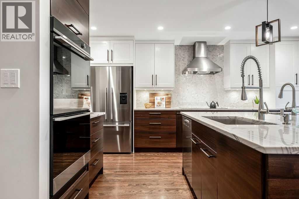 147 Oakside Place Sw, Calgary, Alberta  T2V 4R1 - Photo 11 - A2269066