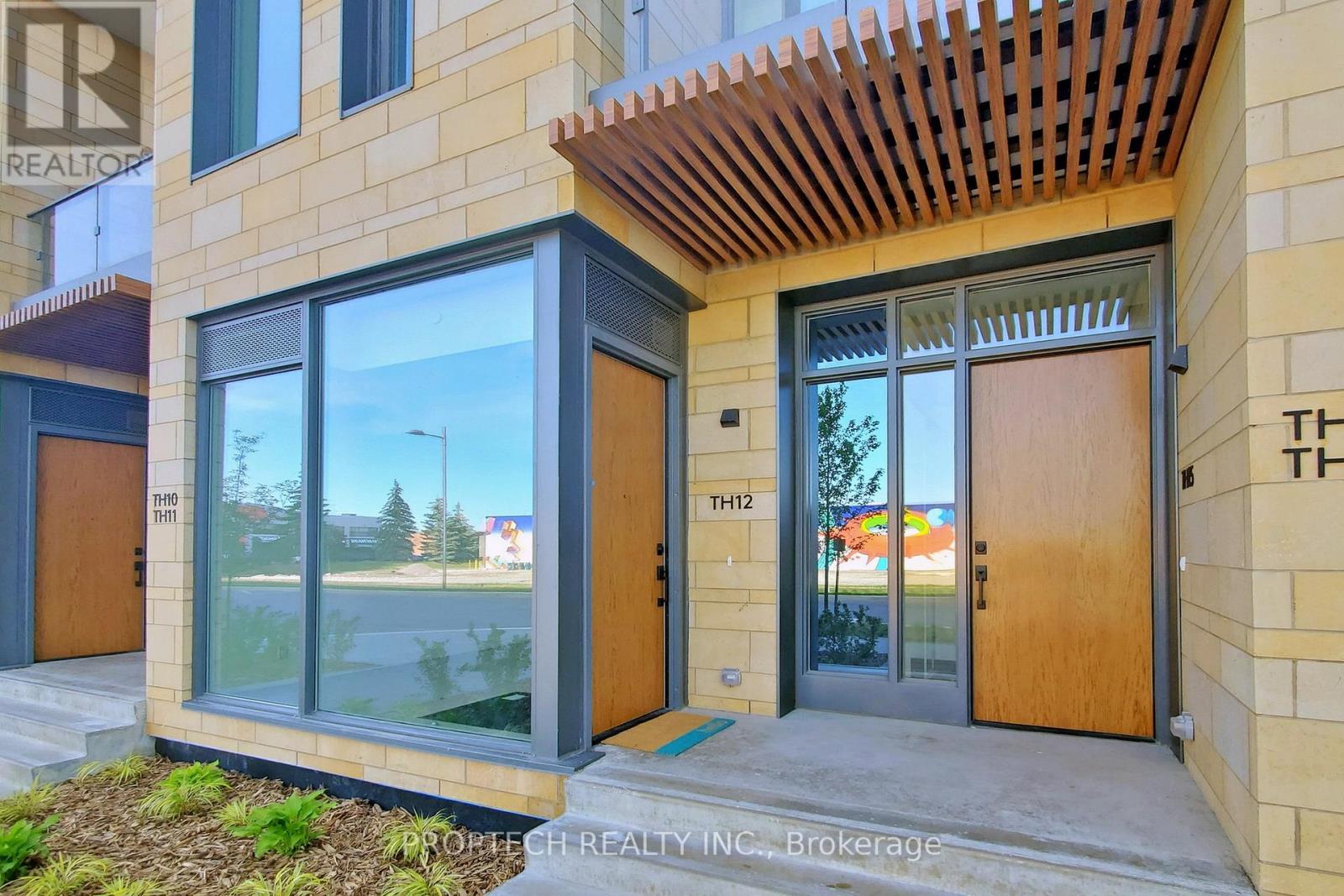 Th12 - 7 Buttermill Avenue, Vaughan, Ontario  L4K 0M5 - Photo 2 - N12527222