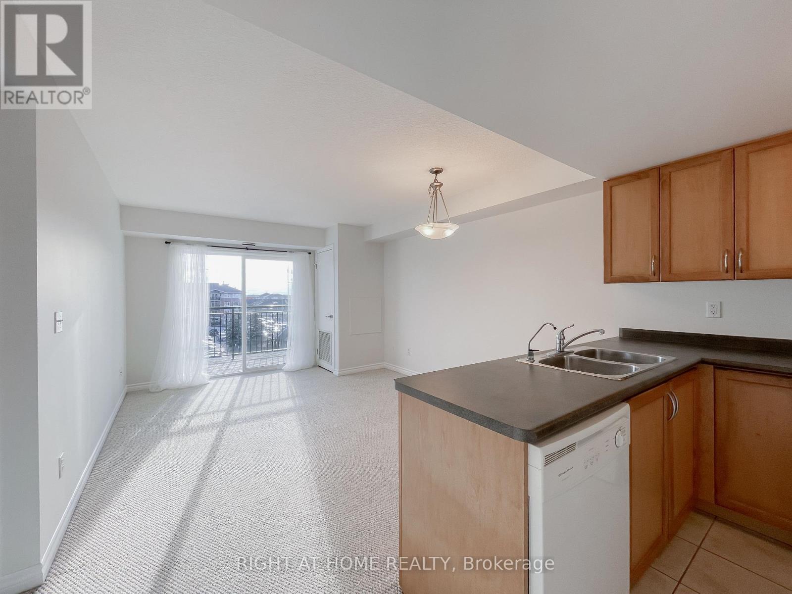 409 - 41 Goodwin Drive, Guelph, Ontario N1L 0E7 - Photo 2 - X12527306