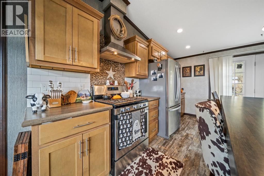 265115 Range Road 55, Rural Rocky View County, Alberta T4C 1B7 - Photo 5 - A2253439