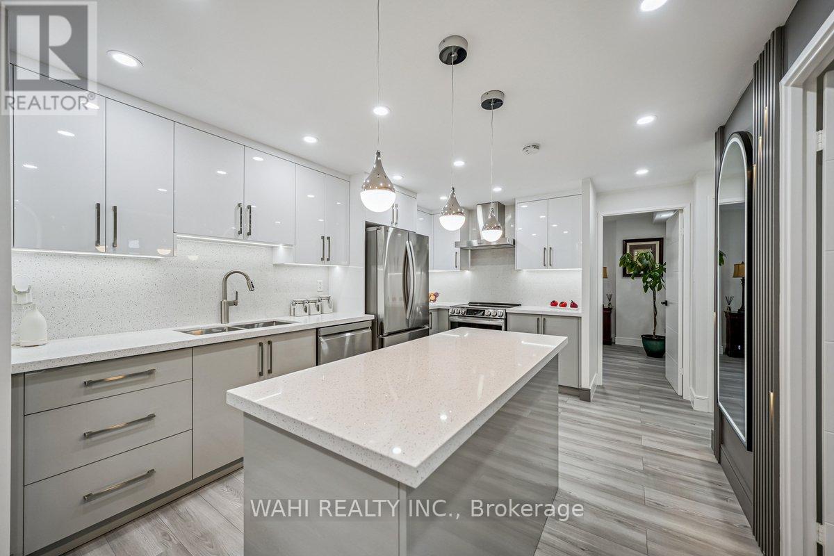 1003 - 299 Mill Road, Toronto, Ontario  M9C 4V9 - Photo 2 - W12525412