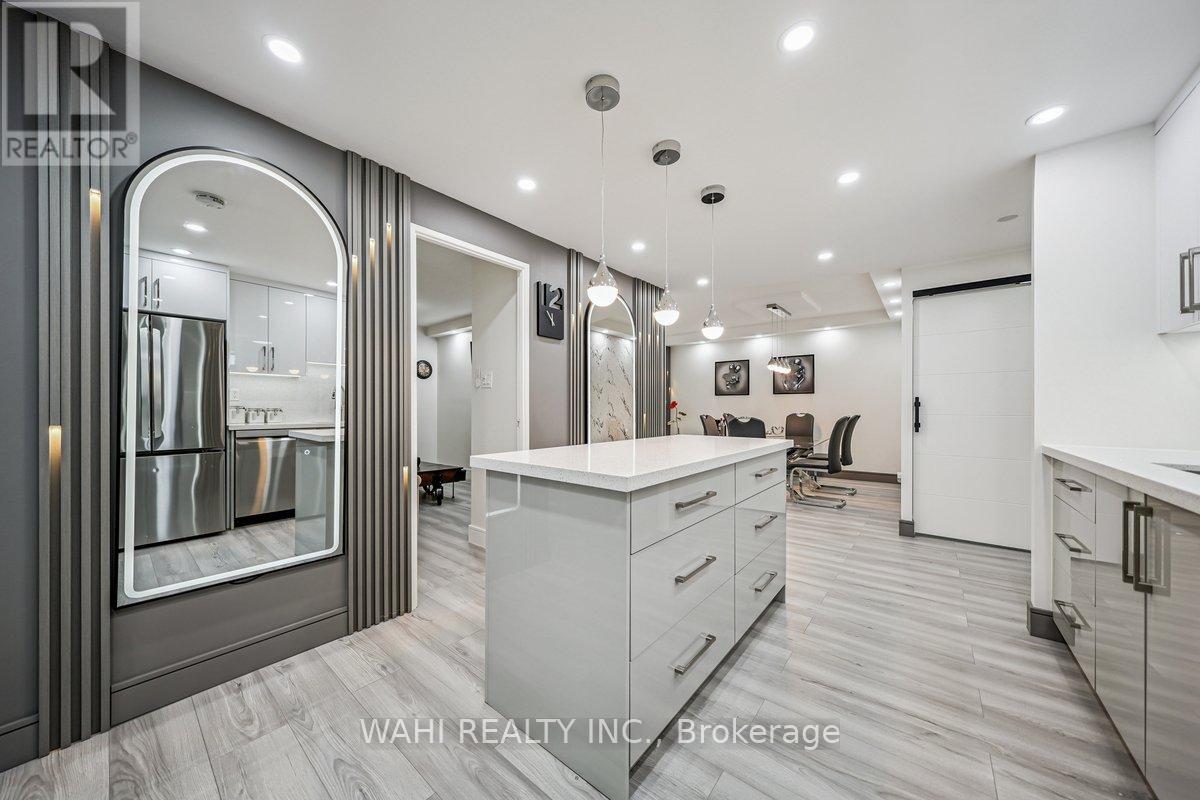 1003 - 299 Mill Road, Toronto, Ontario  M9C 4V9 - Photo 3 - W12525412