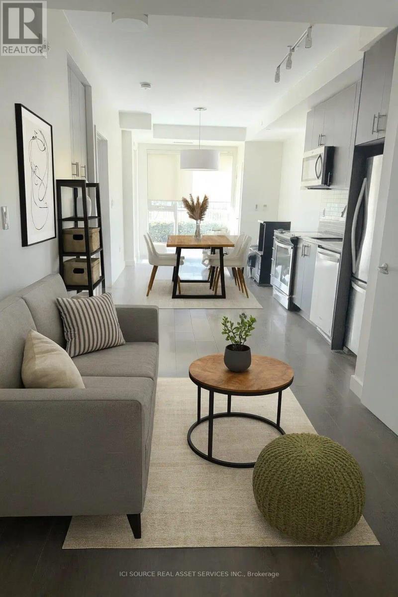 104 - 210 Sabina Drive, Oakville, Ontario  L6H 7C3 - Photo 3 - W12527536