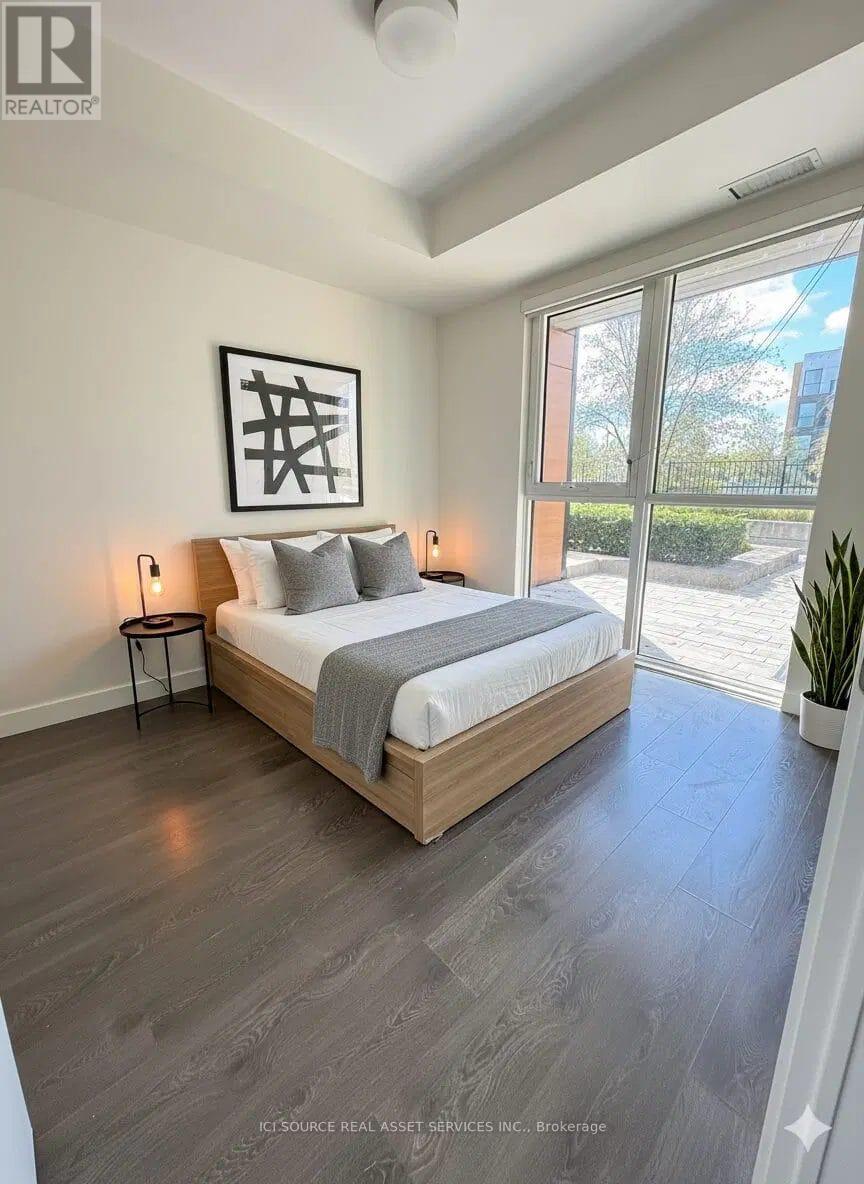 104 - 210 Sabina Drive, Oakville, Ontario  L6H 7C3 - Photo 8 - W12527536