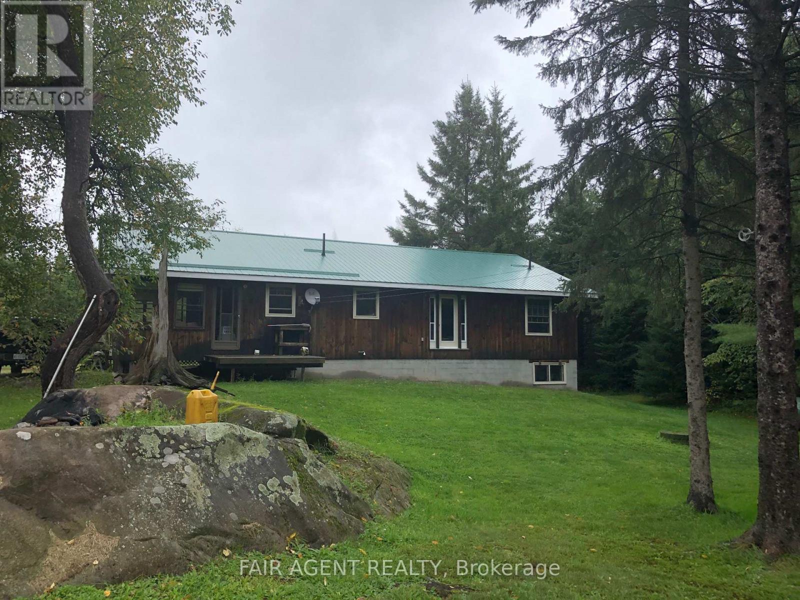 68 Wah-Wash-Kesh Road, Whitestone, Ontario  P0A 1G0 - Photo 3 - X12527624