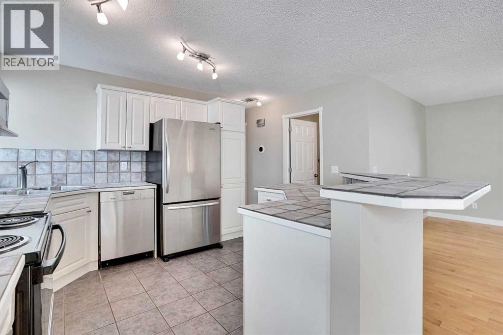 307 Arbour Grove Close Nw, Calgary, Alberta  T3G 4J3 - Photo 13 - A2257219