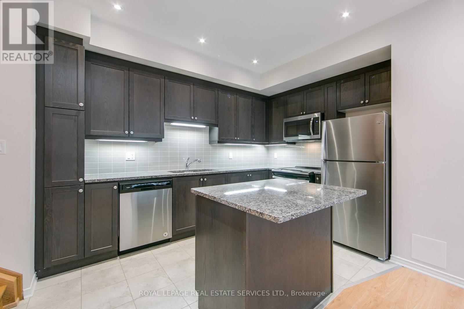 79 - 23 Applewood Lane, Toronto, Ontario  M9C 0C1 - Photo 4 - W12528386