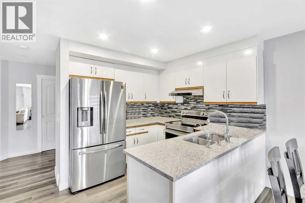 59 Martin Crossing Park Ne, Calgary, Alberta  T3J 3N6 - Photo 8 - A2247606