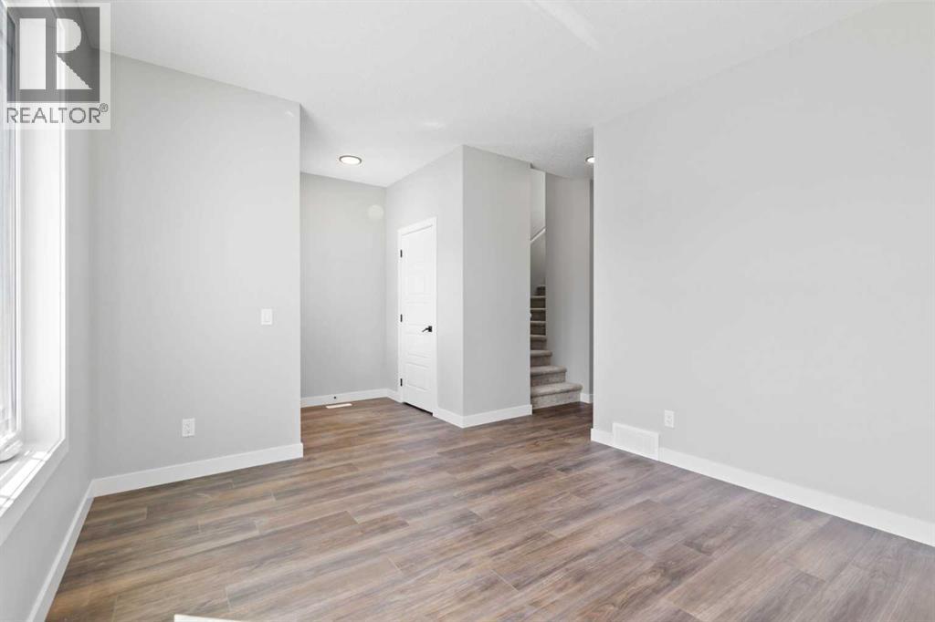 65 Amblefield Heights Nw, Calgary, Alberta  T3P 2K1 - Photo 6 - A2269561