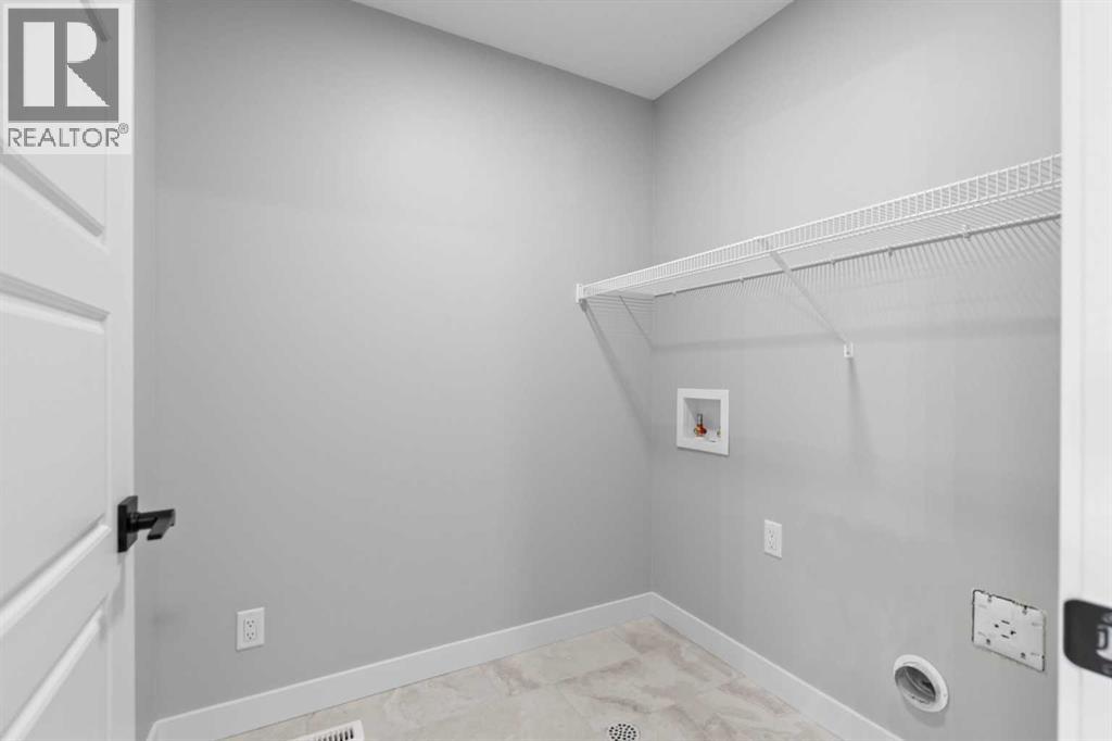 65 Amblefield Heights Nw, Calgary, Alberta  T3P 2K1 - Photo 32 - A2269561