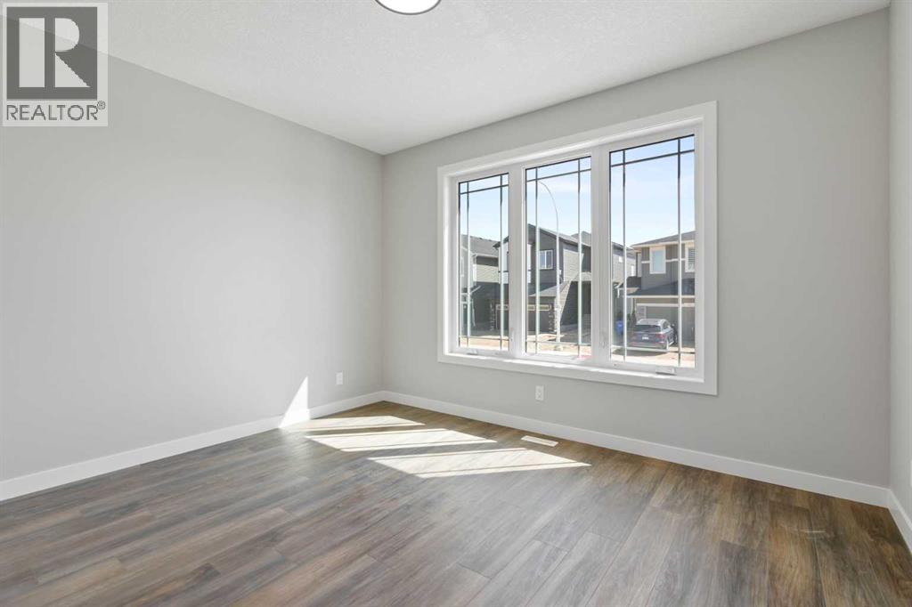 65 Amblefield Heights Nw, Calgary, Alberta  T3P 2K1 - Photo 8 - A2269561