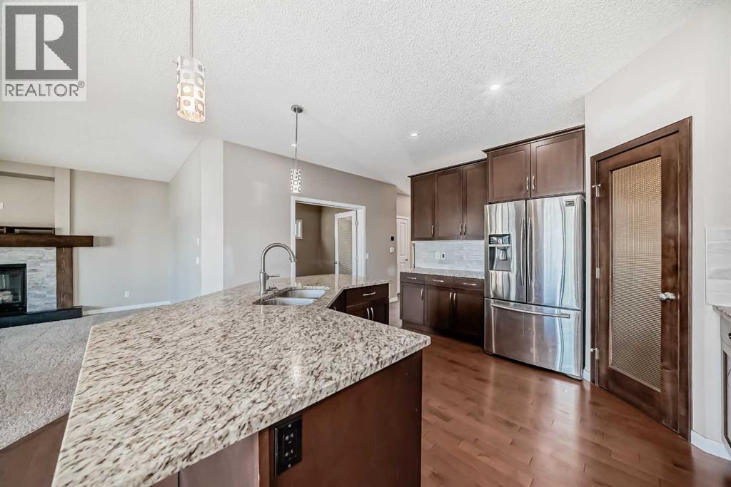 144 Reunion Grove Nw, Airdrie, Alberta  T4B 0Z2 - Photo 5 - A2262349