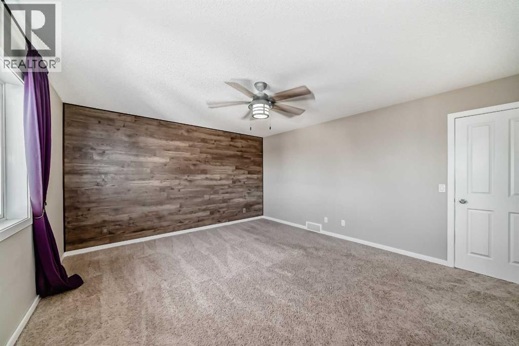 144 Reunion Grove Nw, Airdrie, Alberta  T4B 0Z2 - Photo 37 - A2262349