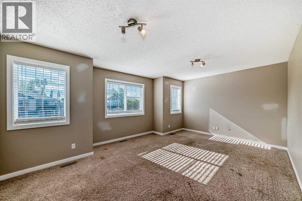 144 Reunion Grove Nw, Airdrie, Alberta  T4B 0Z2 - Photo 12 - A2262349