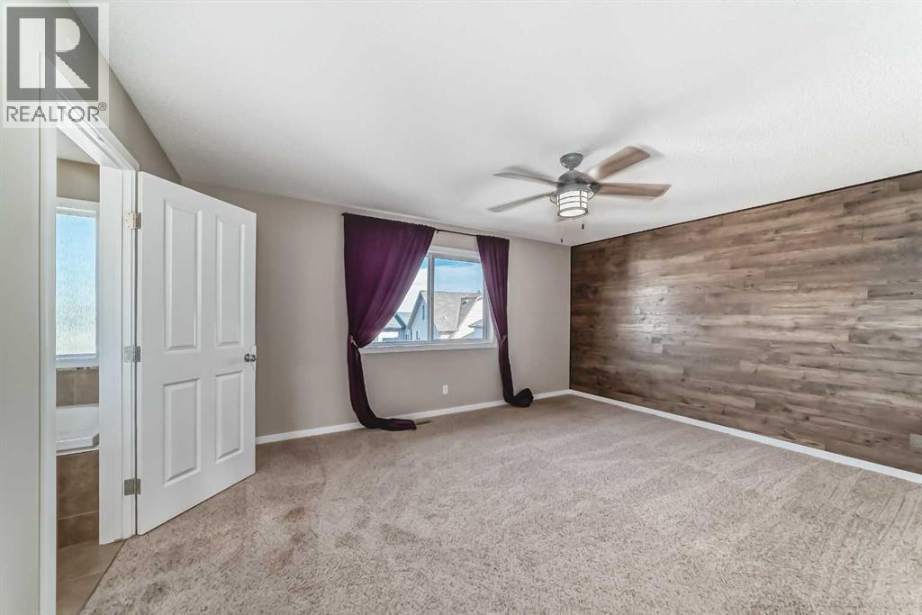 144 Reunion Grove Nw, Airdrie, Alberta  T4B 0Z2 - Photo 35 - A2262349