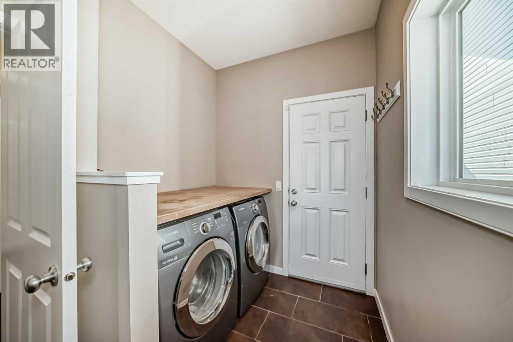 144 Reunion Grove Nw, Airdrie, Alberta  T4B 0Z2 - Photo 47 - A2262349