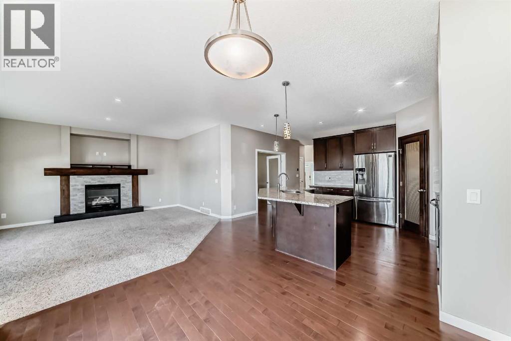144 Reunion Grove Nw, Airdrie, Alberta  T4B 0Z2 - Photo 4 - A2262349