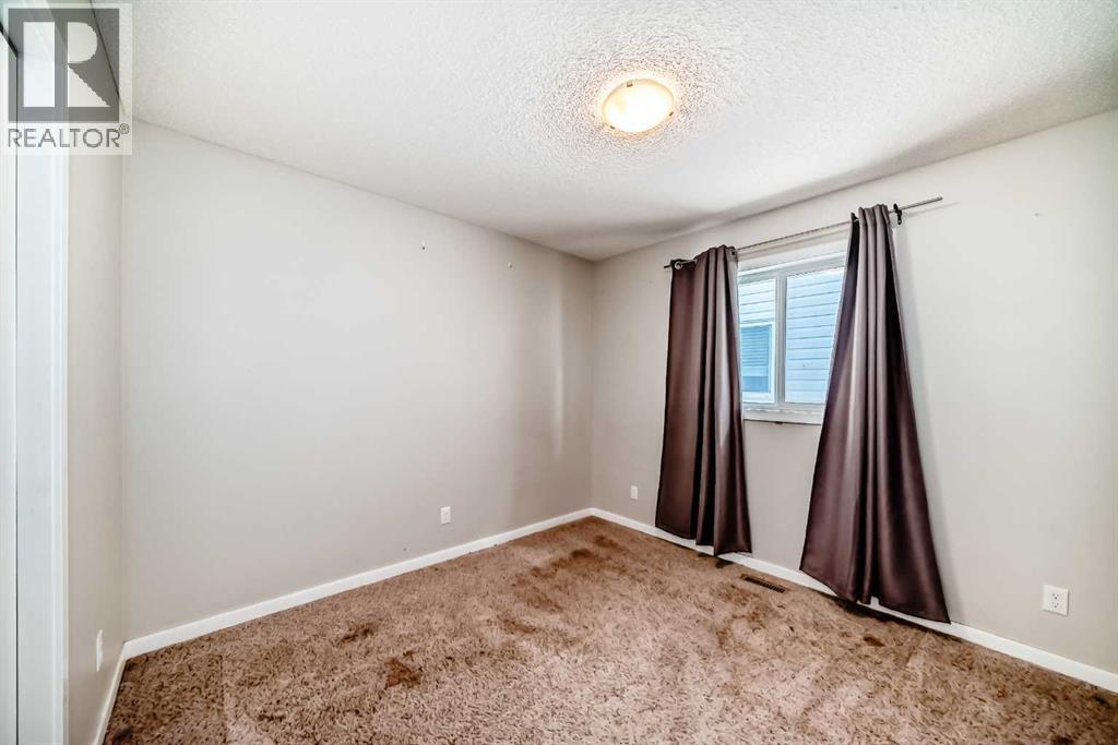 144 Reunion Grove Nw, Airdrie, Alberta  T4B 0Z2 - Photo 19 - A2262349