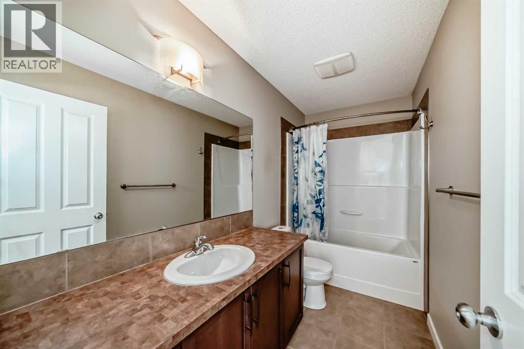 144 Reunion Grove Nw, Airdrie, Alberta  T4B 0Z2 - Photo 7 - A2262349