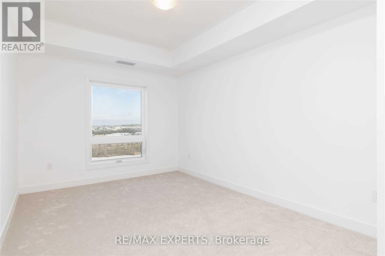 604 - 4 Spice Way, Barrie, Ontario  L9J 0M2 - Photo 11 - S12529010