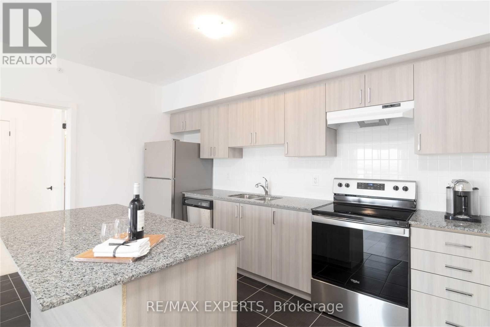 604 - 4 Spice Way, Barrie, Ontario  L9J 0M2 - Photo 2 - S12529010