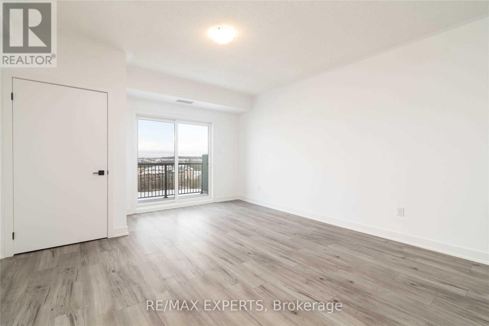 604 - 4 Spice Way, Barrie, Ontario  L9J 0M2 - Photo 5 - S12529010