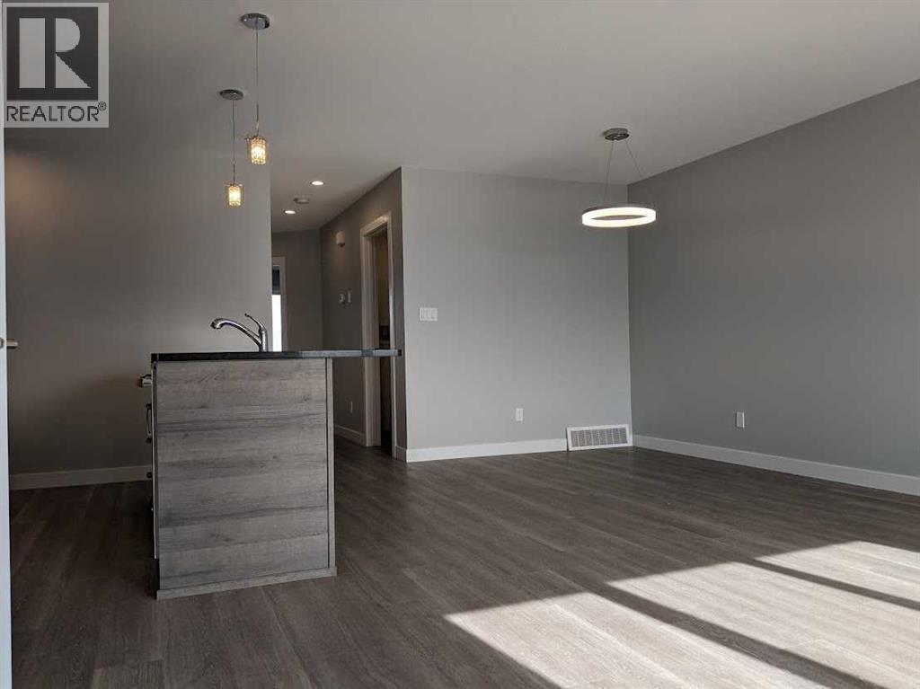 A & B, 25 & 29 Sage Bush Avenue, Taber, Alberta  T1G 0E8 - Photo 6 - A2264292