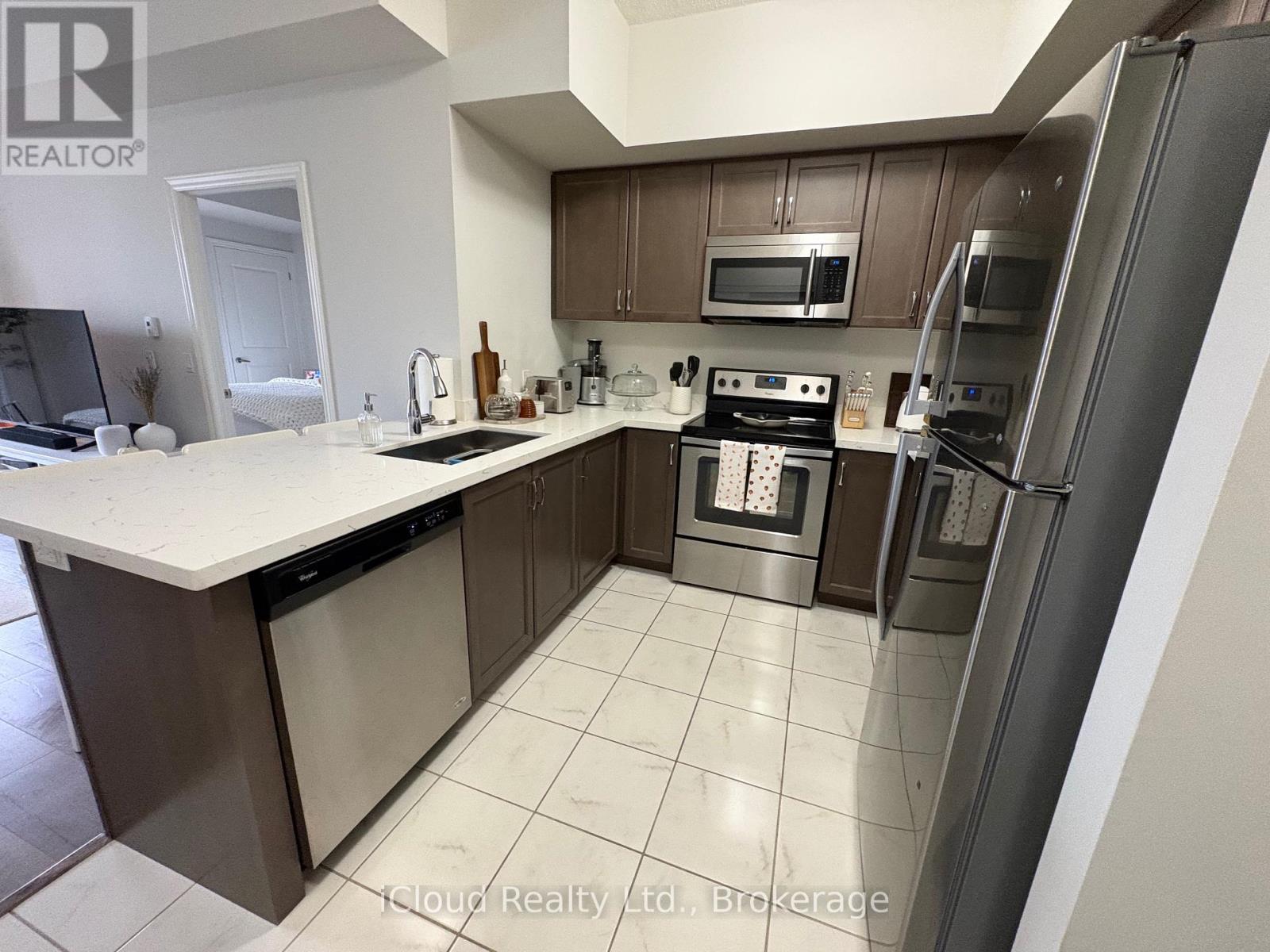 218 - 640 Sauve Street, Milton, Ontario  L9T 9A7 - Photo 5 - W12529026