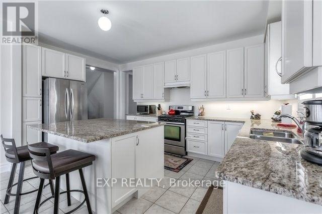 48 Intrigue Trail, Brampton, Ontario  L6X 0W9 - Photo 6 - W12529208