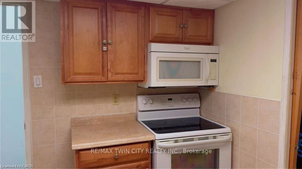 23 Westchester Drive, Kitchener, Ontario  N2B 3T1 - Photo 3 - X12529728