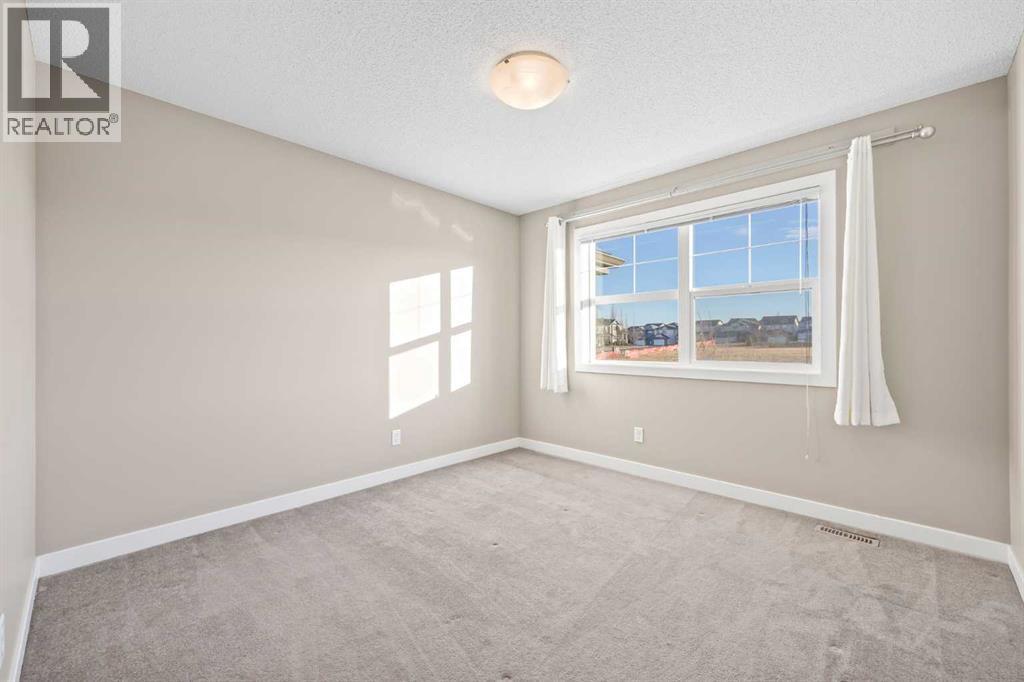 82 Panatella Road Nw, Calgary, Alberta  T3K 0S7 - Photo 12 - A2269711