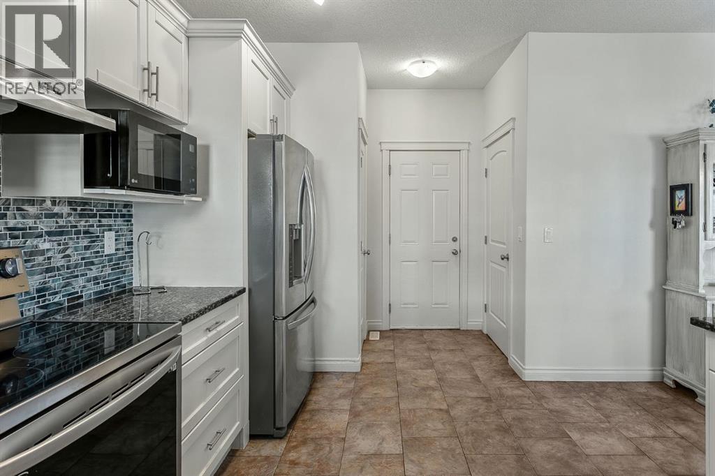 30 Baywater Cape Sw, Airdrie, Alberta  T4B 0B3 - Photo 11 - A2218370